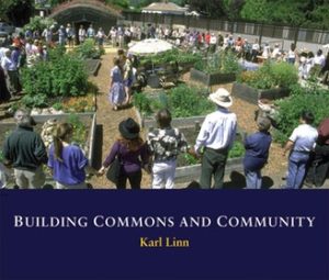 Cover of Building Commons and Community by Karl Linn including a photograph of several people gathered in a circle around a thriving garden in the middle of an urban environment