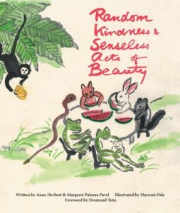 Cover of Random Kindness and Senseless Acts of Beauty by Anne Herbert and Margaret Paloma Pavel, illustrated by Mayumi Oda, and foreword by Desmond Tuto. The image is a watercolor painting of seven animals (a bunny, skunk, a family of frogs, a snake, and a fox) eating watermelon at a table while a monkey holding bananas hangs from a tree on the top left.